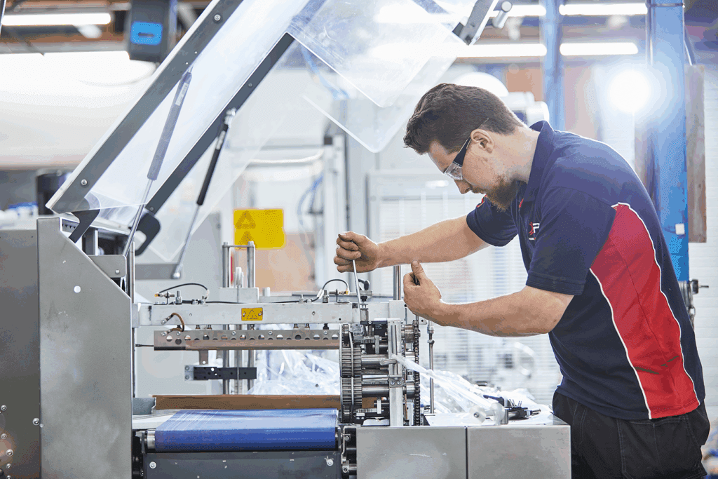 YPS engineer using industrial packaging machine