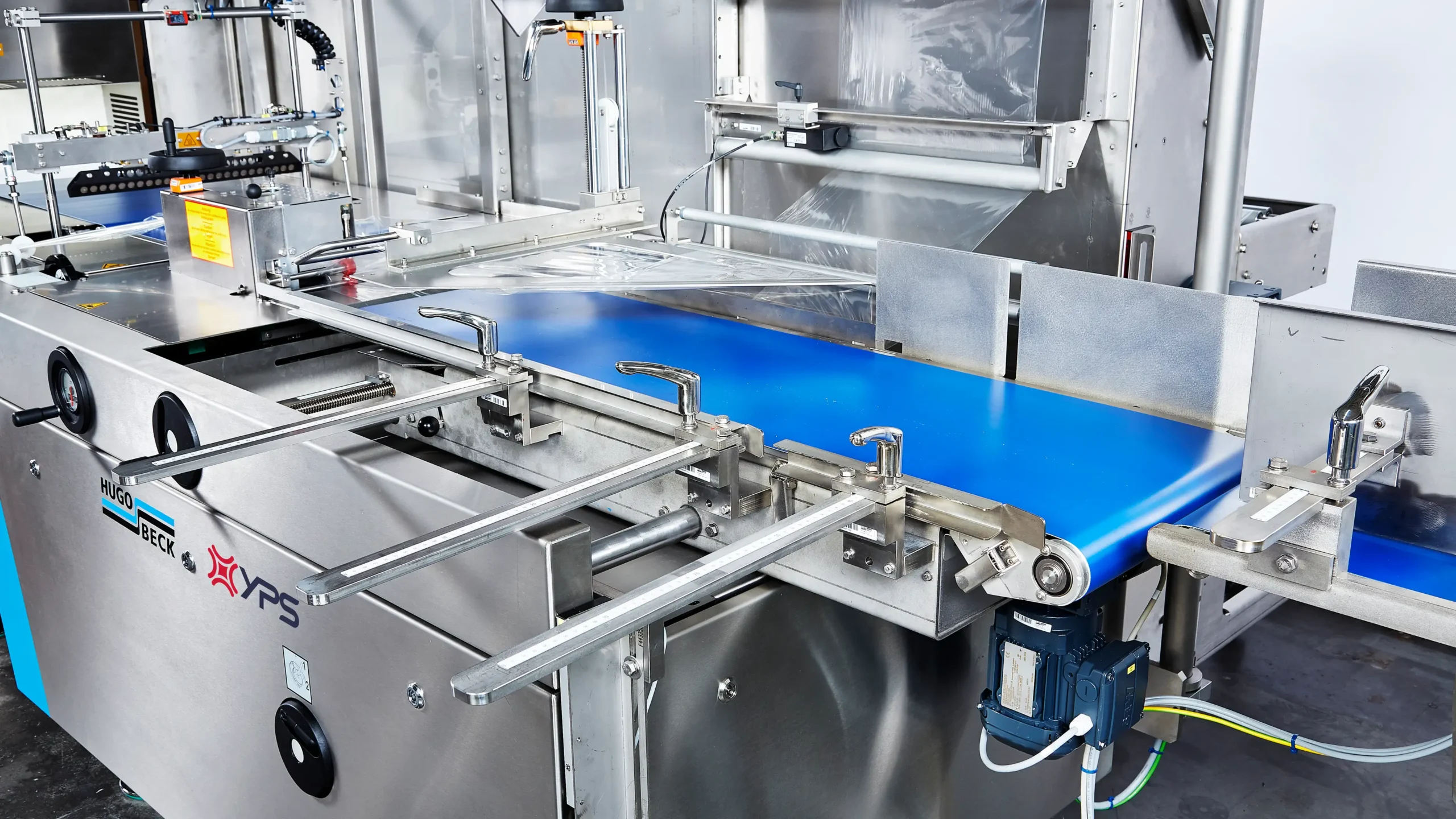 Close up of YPS Hugo beck industrial packaging machine